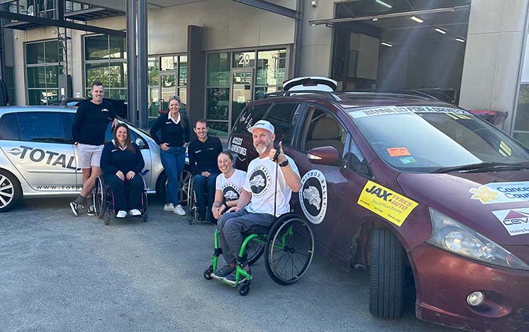 Chris Astill with sponsors Total Ability, Jax Tyres and Access Adventures