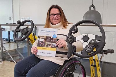 Michelina Pelosi with the 2025 Edition of the Complete Guide to Driving With Disability